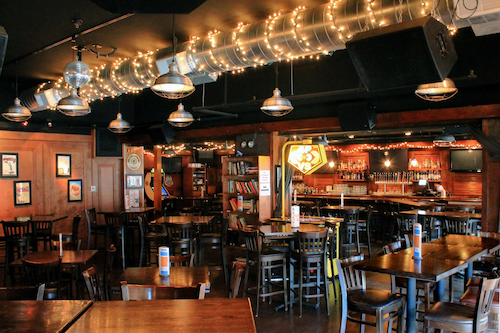 interior of a cozy bar with lots of wood, Haymarket Pub & Brewery
